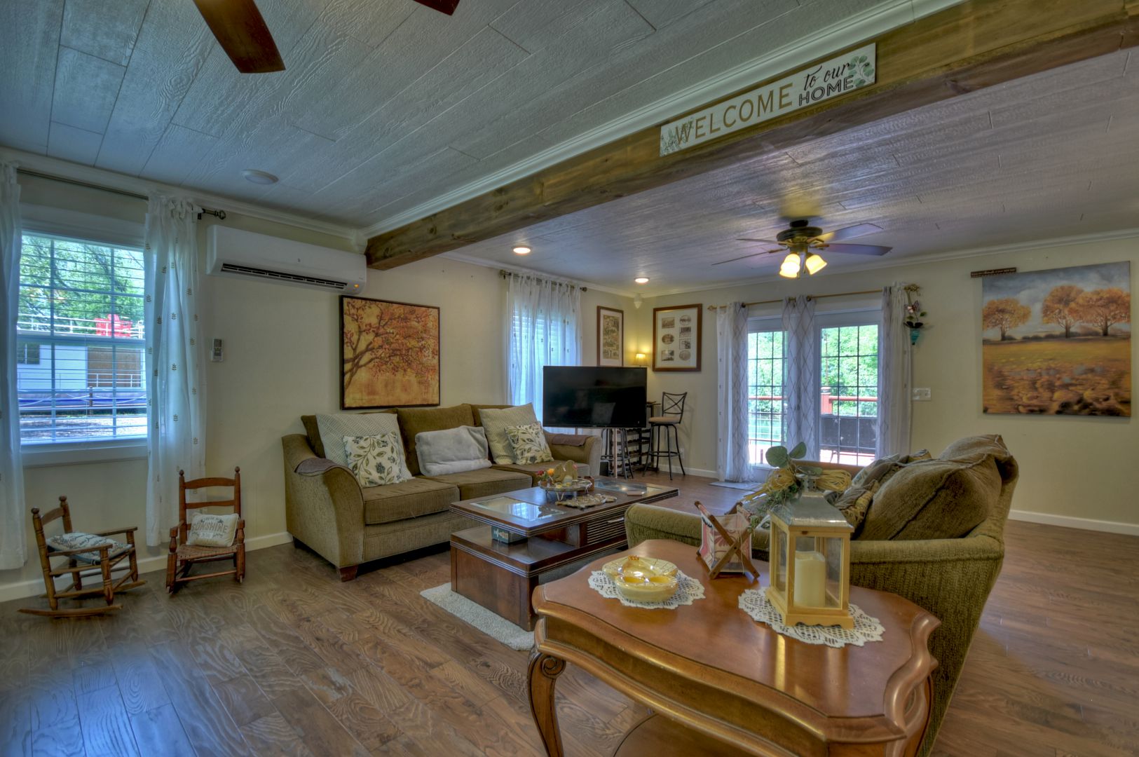 Living room with beam ceiling